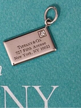 Tiffany & Co. Sterling Silver Envelope w/ Single Diamond Pendant